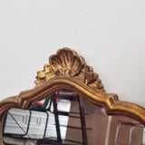 Miroir style Louis XV doré