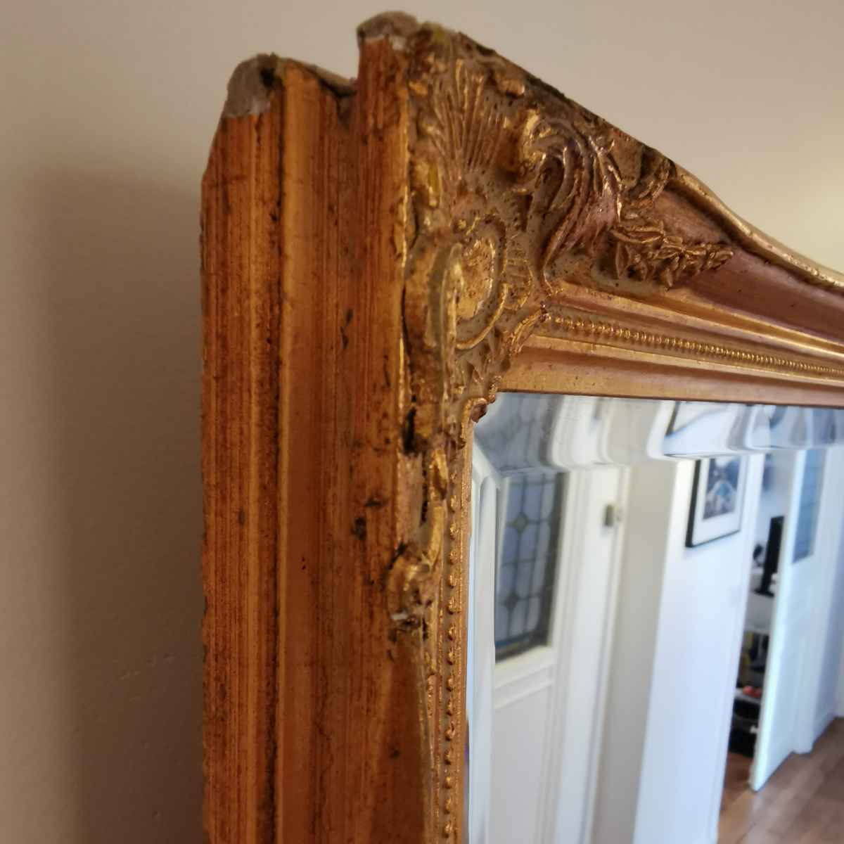 Miroir ancien style Napoléon 3 motif fleuris aux coins