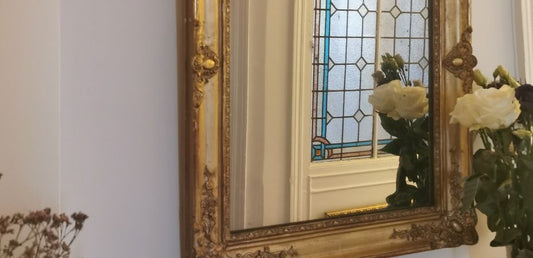 miroir ancien à encadrement doré