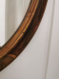 Miroir ovale doré et bois