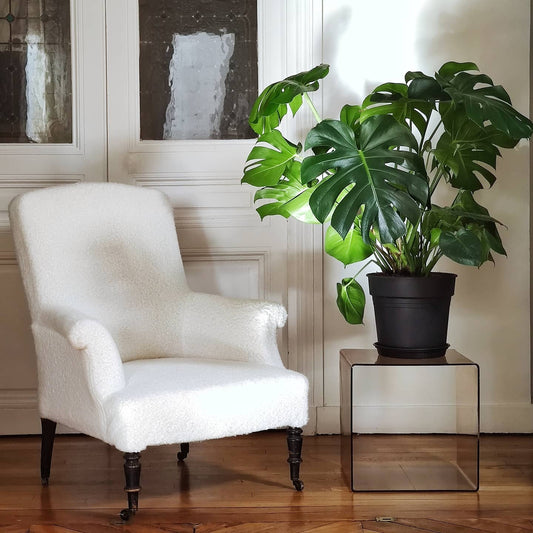 Fauteuil bergère laine bouclée